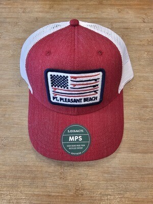 A red and white Legacy brand hat with an adjustable strap and an American flag-inspired patch with red and blue surfboards in place of stripes and the words &quot;Pt. Pleasant Beach&quot; below it in dark blue