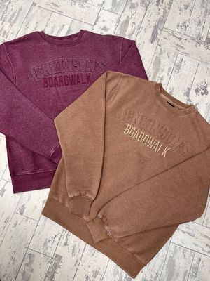 Jenkinson&#39;s Boardwalk crewneck sweatshirts in burgundy (vineyard) and brown (sand)
