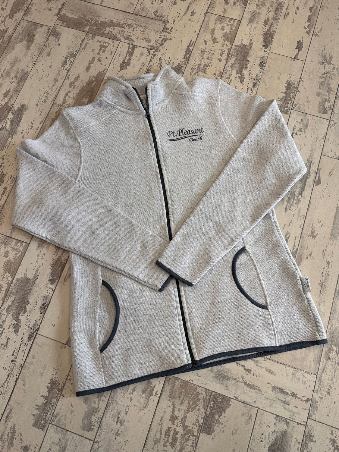 ​A grey full zip Point Pleasant Beach ladies sweatshirt 