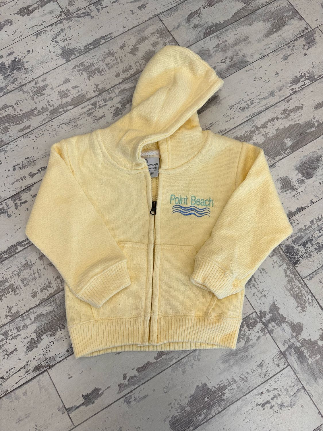 Yellow infant hooded sweatshirt with Point Beach and a wave embroidered on one side