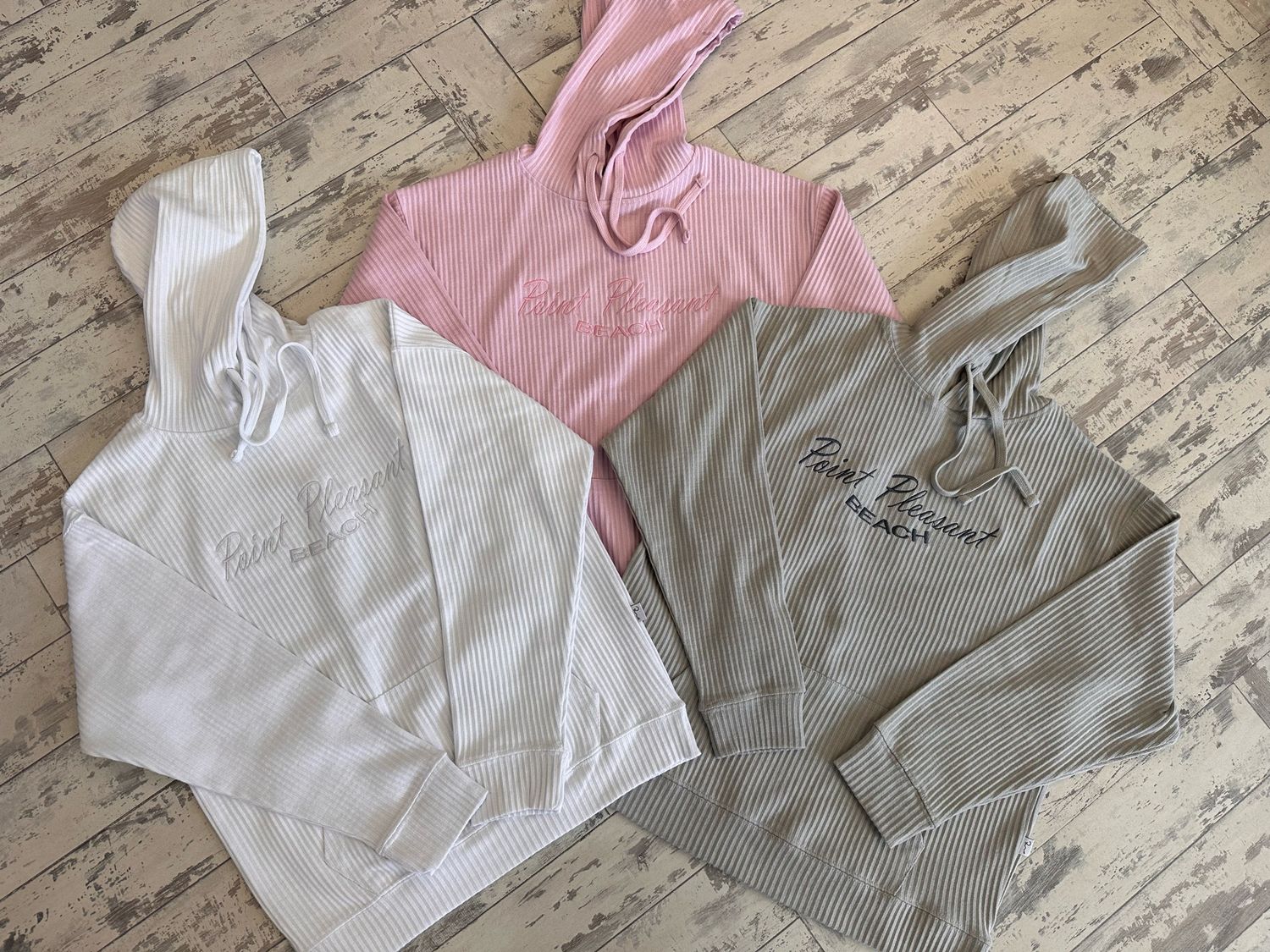 Point Pleasant Beach adult rib hooded sweatshirt available in white, pink, and grey sold by Jenkinson&#39;s Boardwalk through its online store