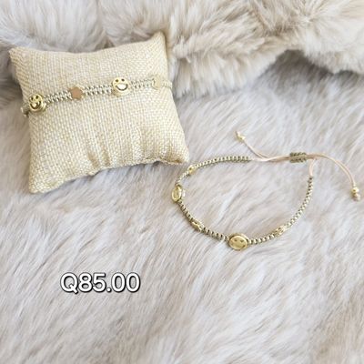 Pulsera caritas felices y flores