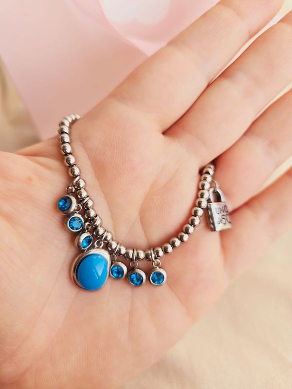 Pulsera de Acero con Dijes Azules