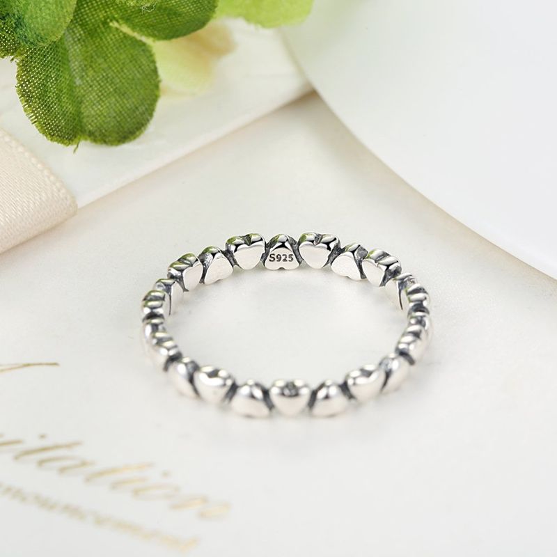 Anillo corazones juntos