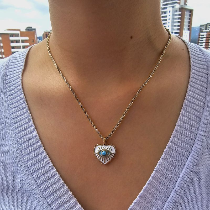 Gargantilla entorchada con Dije de Corazón Dorado y Ojo en el Centro