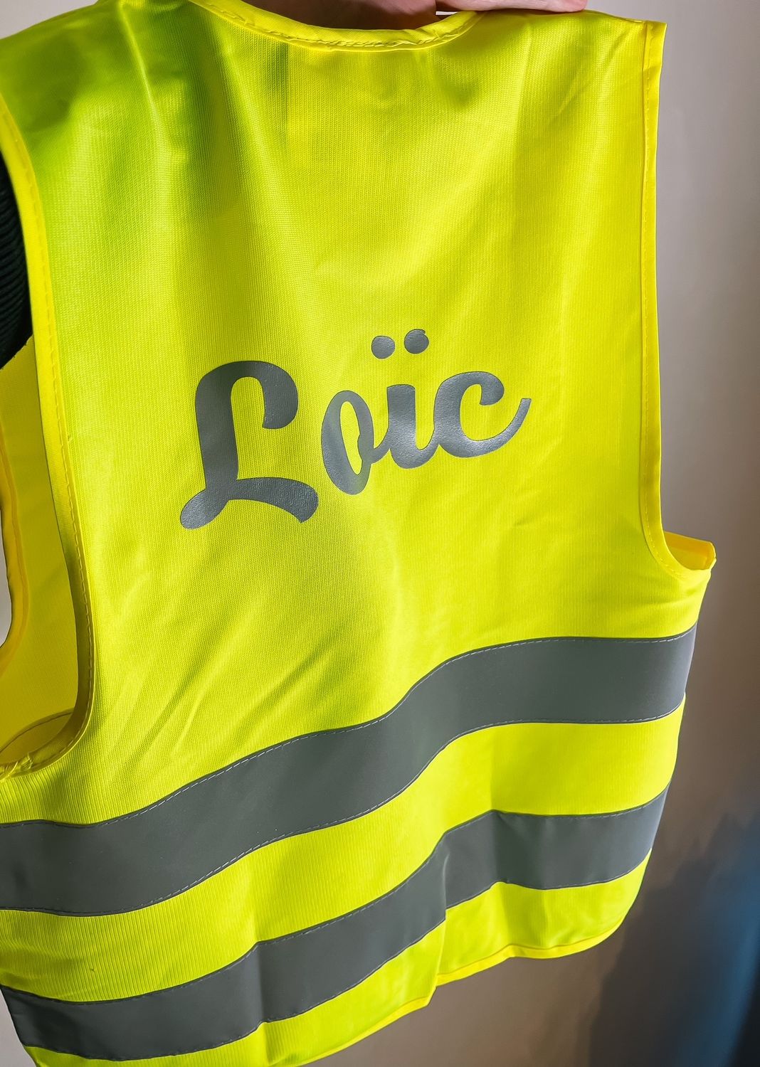 Fluo vest met rits + reflecterende naam