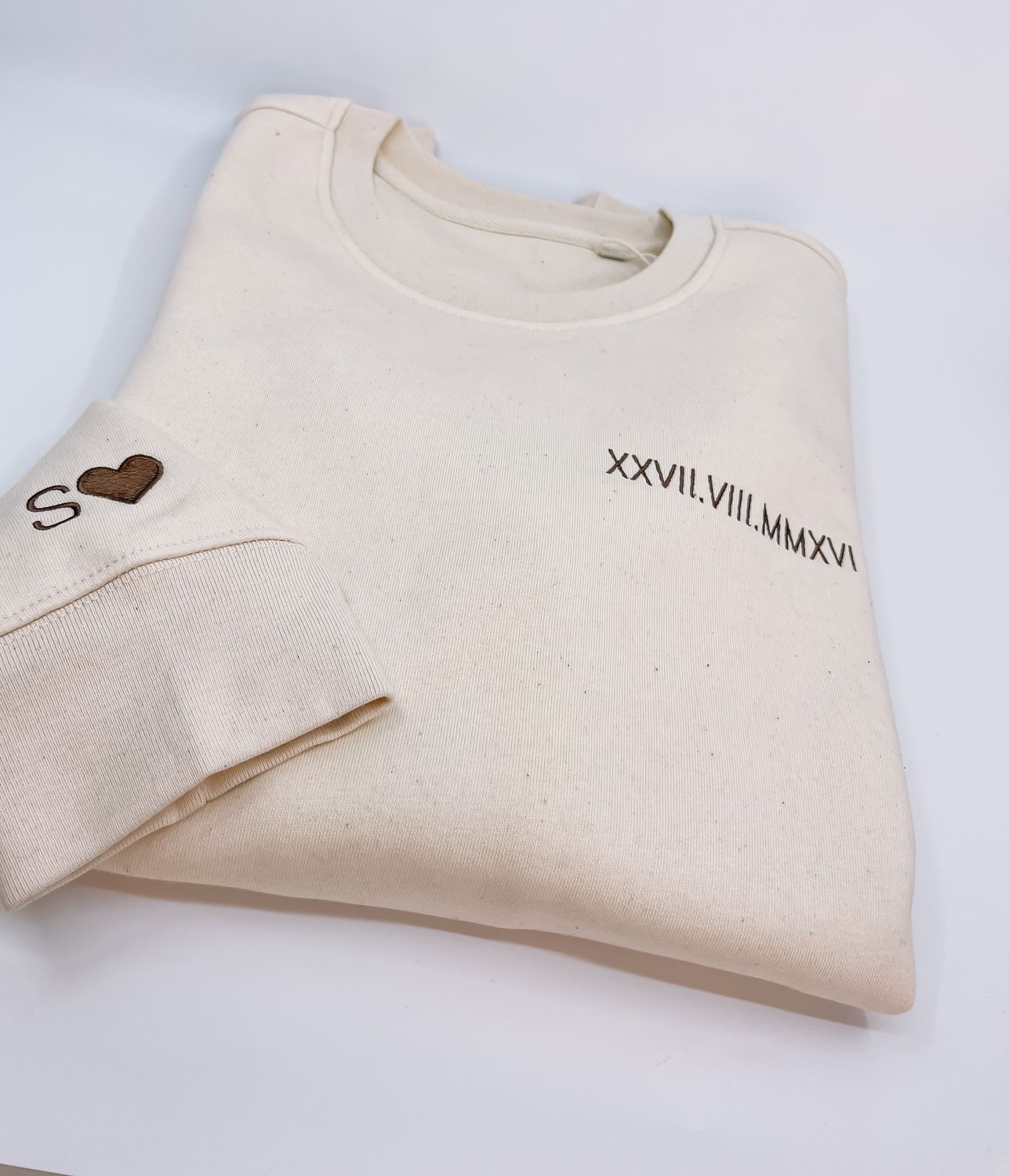 Sweater met Romeinse datum