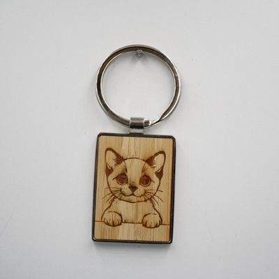 Metalen sleutelhanger, bamboe inleg - Burmees