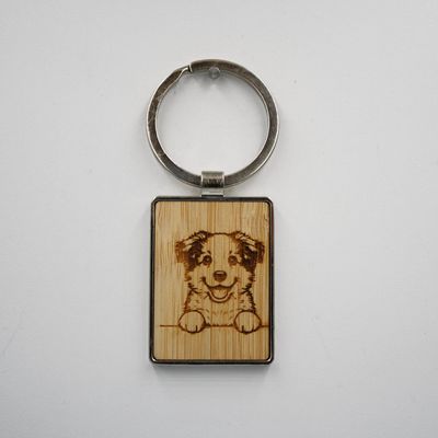Metalen sleutelhanger, bamboe inleg - Border Collie Metalen sleutelhanger, bamboe inleg - Border Collie