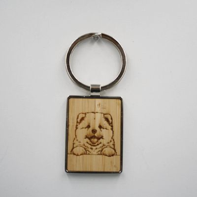 Metalen sleutelhanger, bamboe inleg - Chowchow