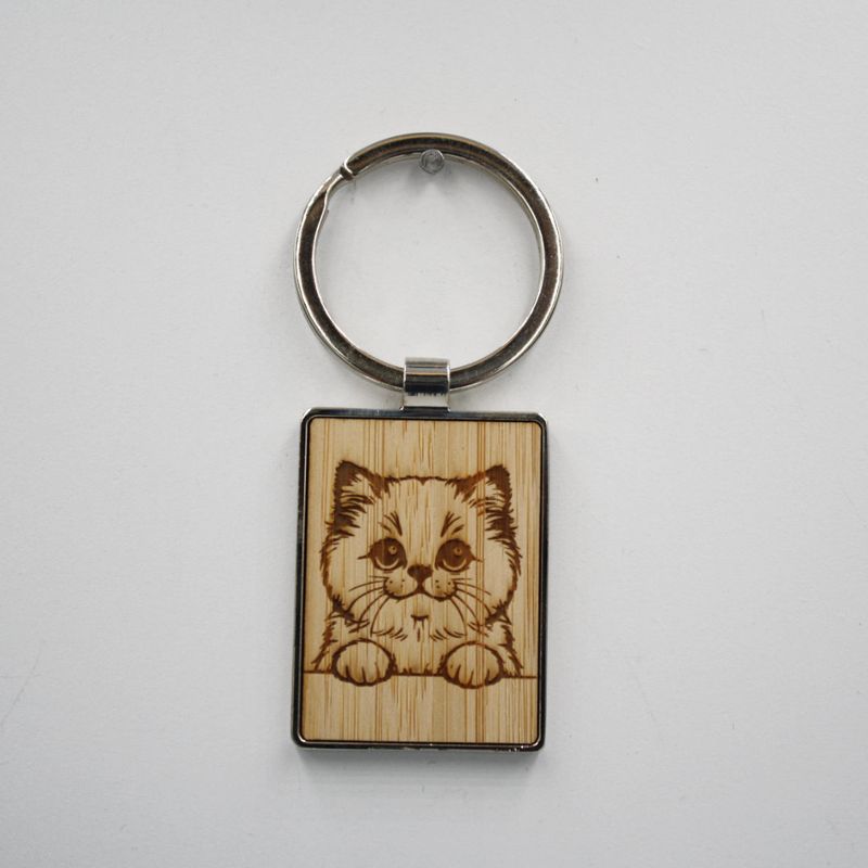 Metalen sleutelhanger, bamboe inleg - Himalayan