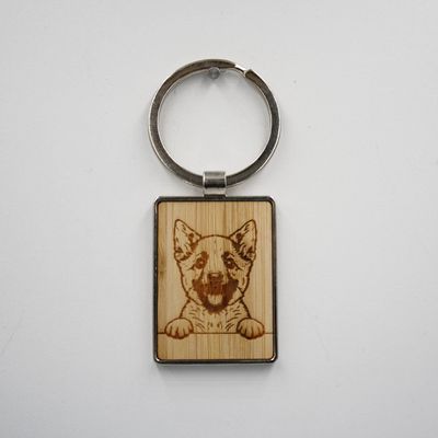 Metalen sleutelhanger, bamboe inleg - Duitse schepper