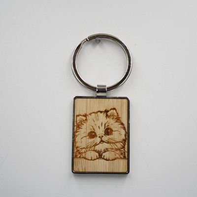 Metalen sleutelhanger, bamboe inleg - Perzische kat