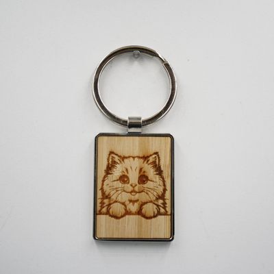 Metalen sleutelhanger, bamboe inleg - Siberische kat