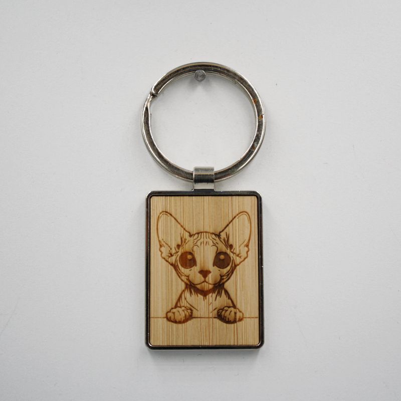 Metalen sleutelhanger, bamboe inleg - Sphinx