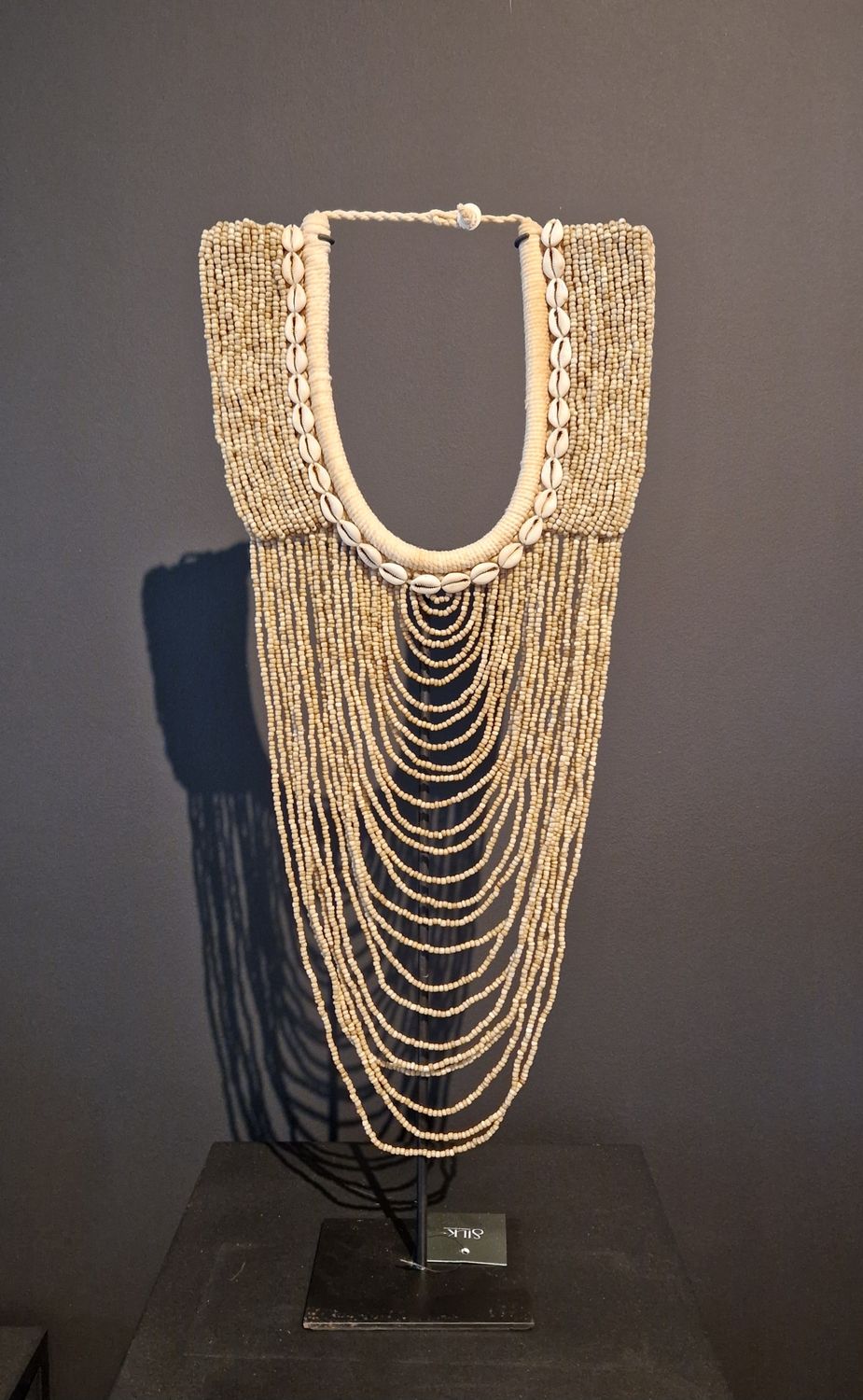 Necklace bruin/crème op voet