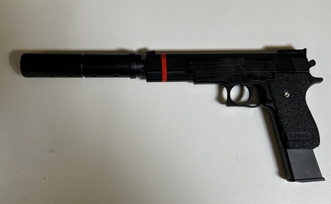 Pistool met geluidsdemper