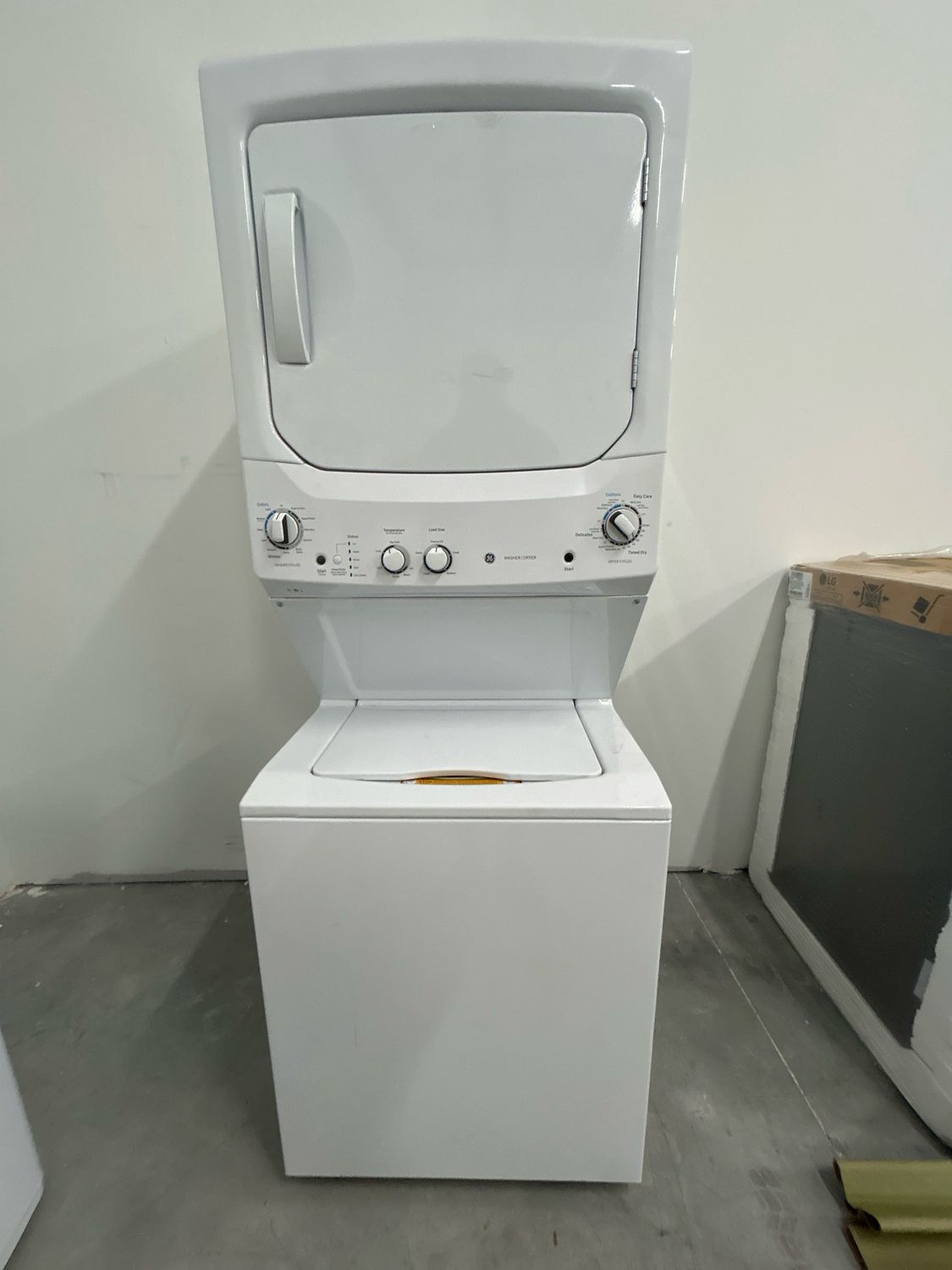 GE GUD27ESSMWW Unitized Spacemaker® 3.8 cu. ft. Capacity Washer with Stainless Steel Basket and 5.9 cu. ft. Capacity Electric Dryer