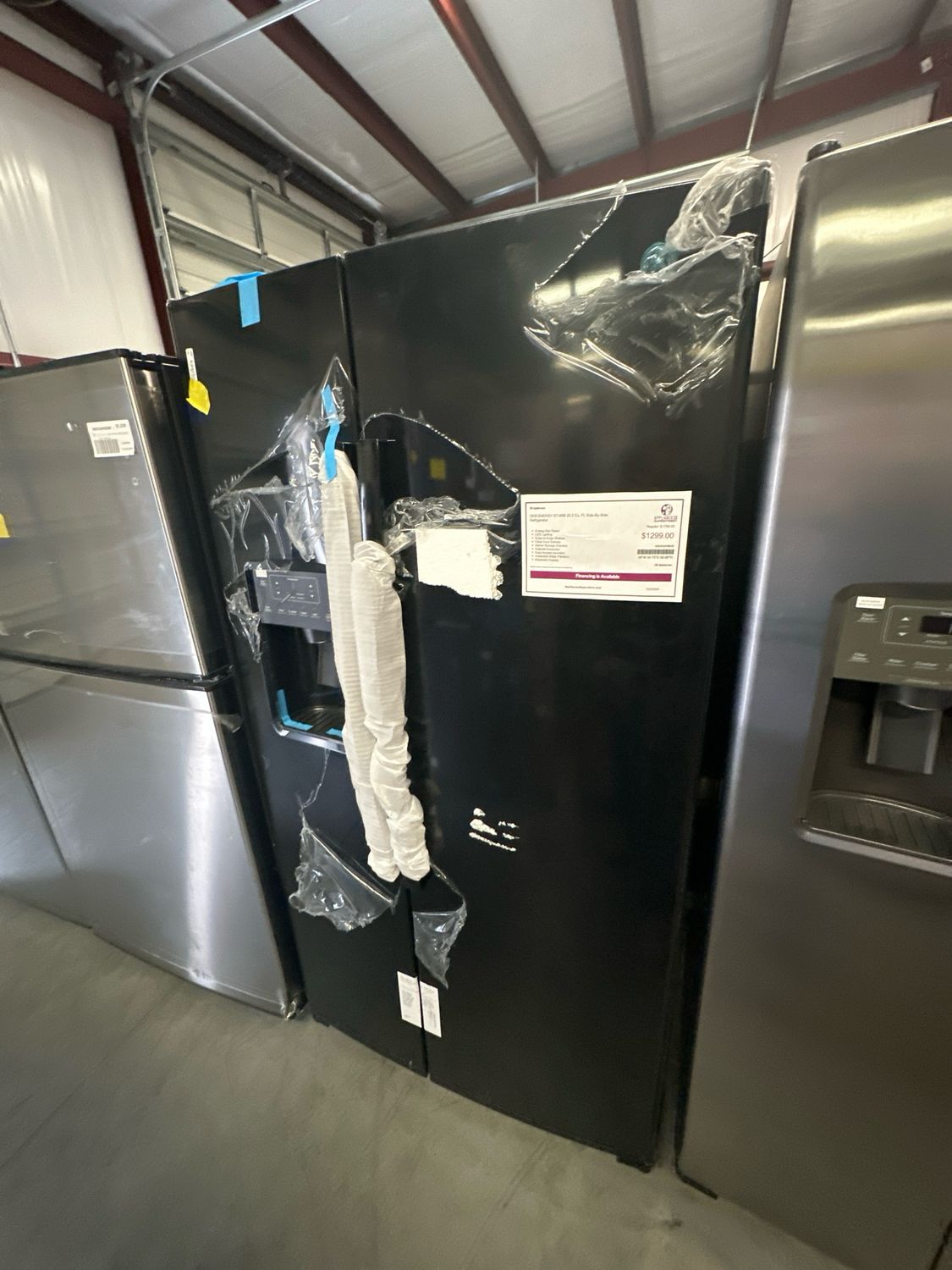 GE GSE25GGPBB  25.3 Cu. Ft. Side-by-Side Refrigerator with External Ice &amp; Water Dispenser - High Gloss Black