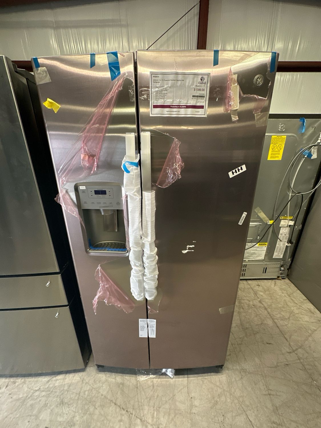 GE GSS25IYNFSOB 25.1 Cu. Ft. Side-By-Side Refrigerator with External Ice &amp; Water Dispenser - Stainless Steel