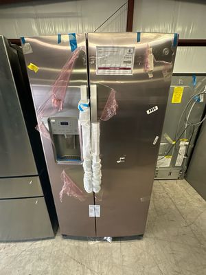 GE GSS25IYNFSOB 25.1 Cu. Ft. Side-By-Side Refrigerator with External Ice &amp; Water Dispenser - Stainless Steel