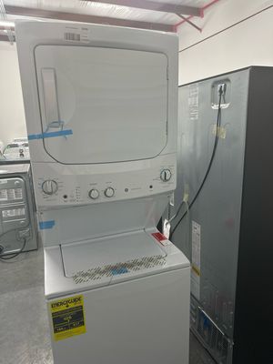 GE GUD27ESPMDG Diamond Gray Unitized Spacemaker 3.8 cu. ft. Washer with Stainless Steel Basket and 5.9 cu. ft. Electric Dryer