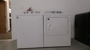 Pre Owned Whirlpool Top Load Washer With Agitator Electric Dryer Set WTW4816FW3MED4815EW1PO