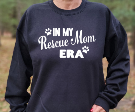 In my Rescue Mom Era Unisex tshirt or crewneck sweatshirt with logo on back
