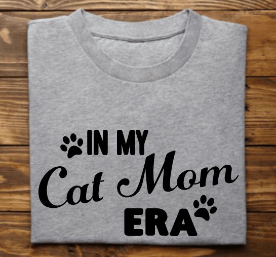 In my Cat Mom Era Unisex tshirt or crewneck sweatshirt with option for rescues Logo on back