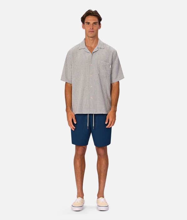 THE AZURE  SWIM SHORT - MID NAVY