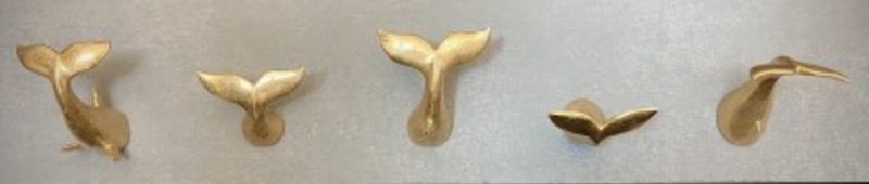Gold Resin Whale Tail on Cement Panel
