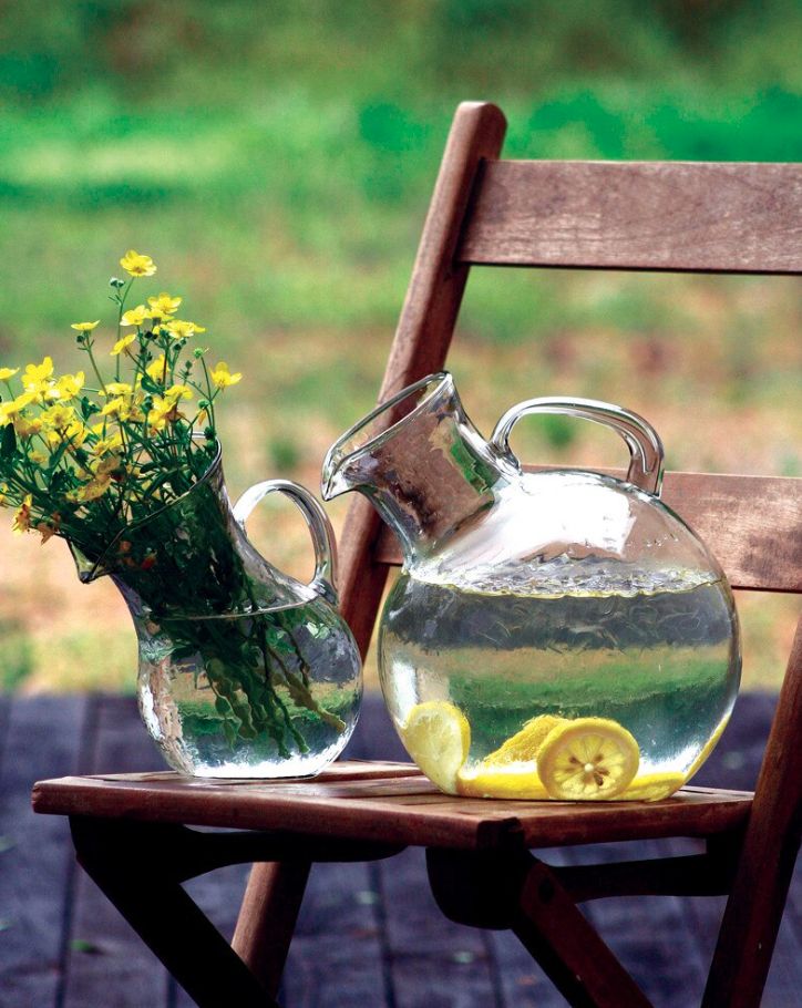 Small Mouthed Circular Tilted Pitcher