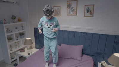 a boy wearing a mask looks like a hero trying to fly