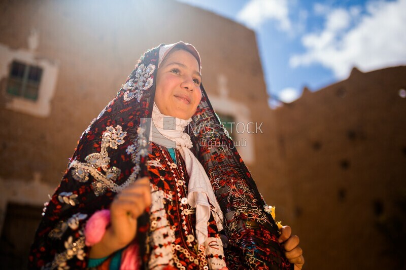 Girl with traditional clothes, landmarks, desert