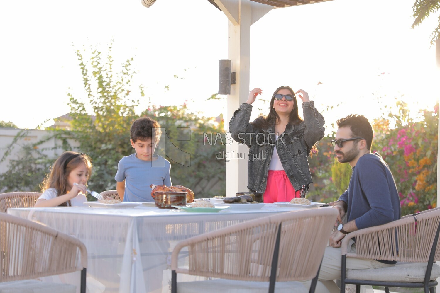 a family eating in the garden