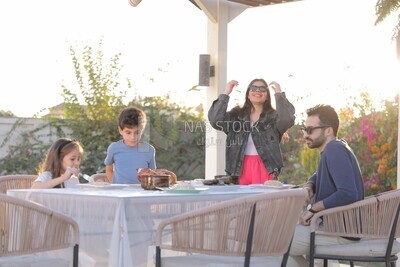 a family eating in the garden