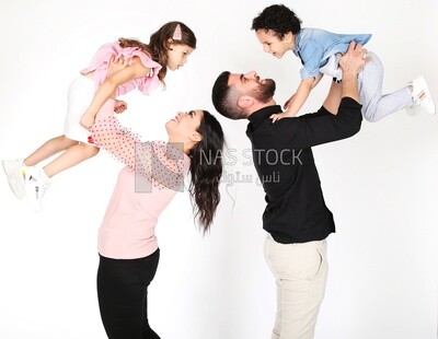 A family of four standing