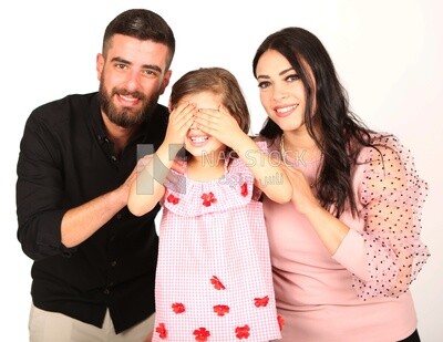 A man and a woman with their daughter