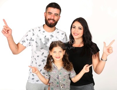 A man and a woman with their daughter