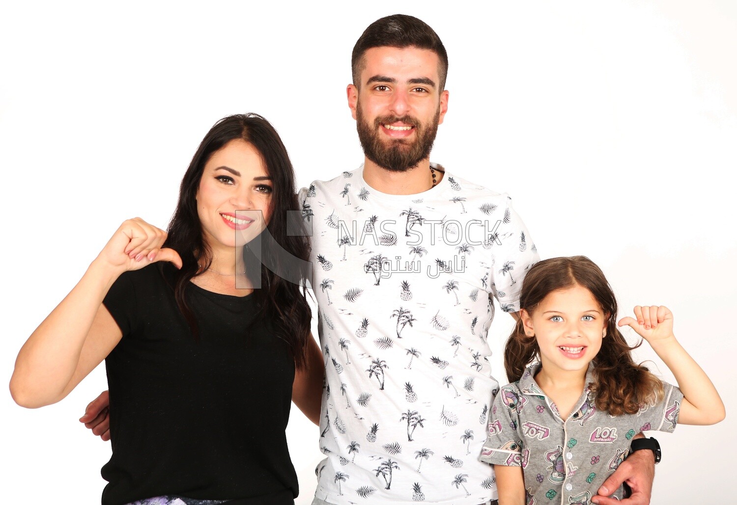 A man and a woman with their daughter