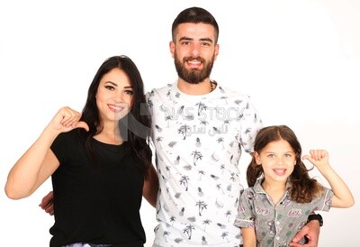A man and a woman with their daughter