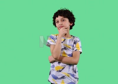 A close up photo of a boy thinking