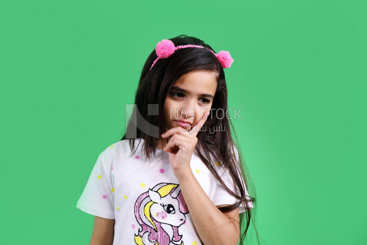 Small girl holding a microphone