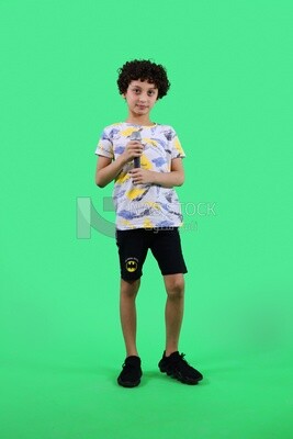 A boy holding a microphone
