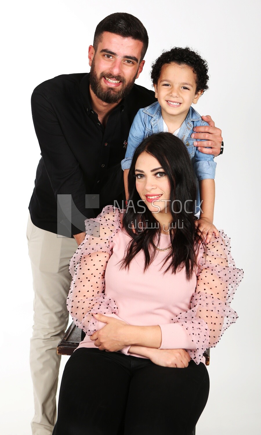 A man and a woman with their son