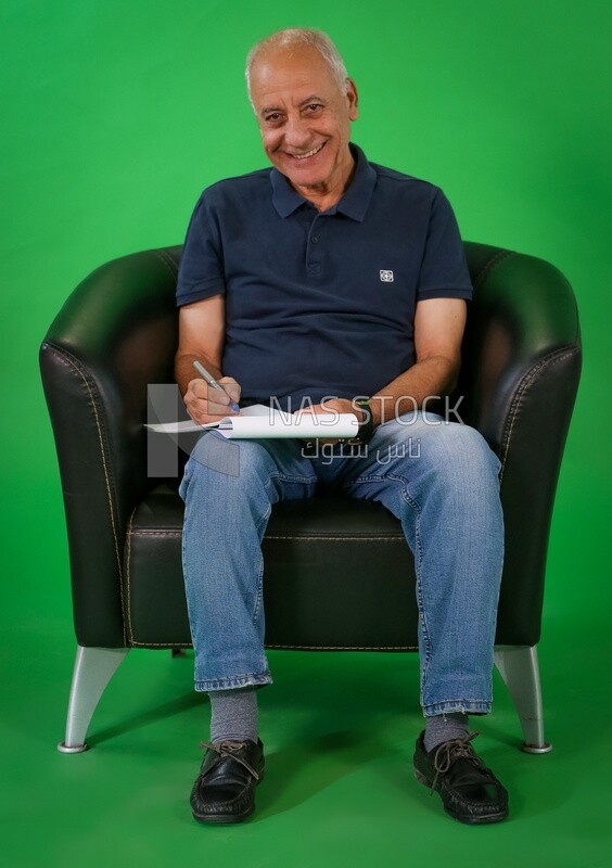 An elderly man sitting