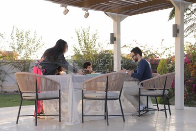 a family eating in the garden