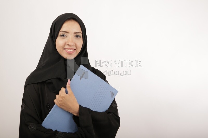 Businesswoman holds documents