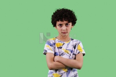 A close up photo of a boy angry