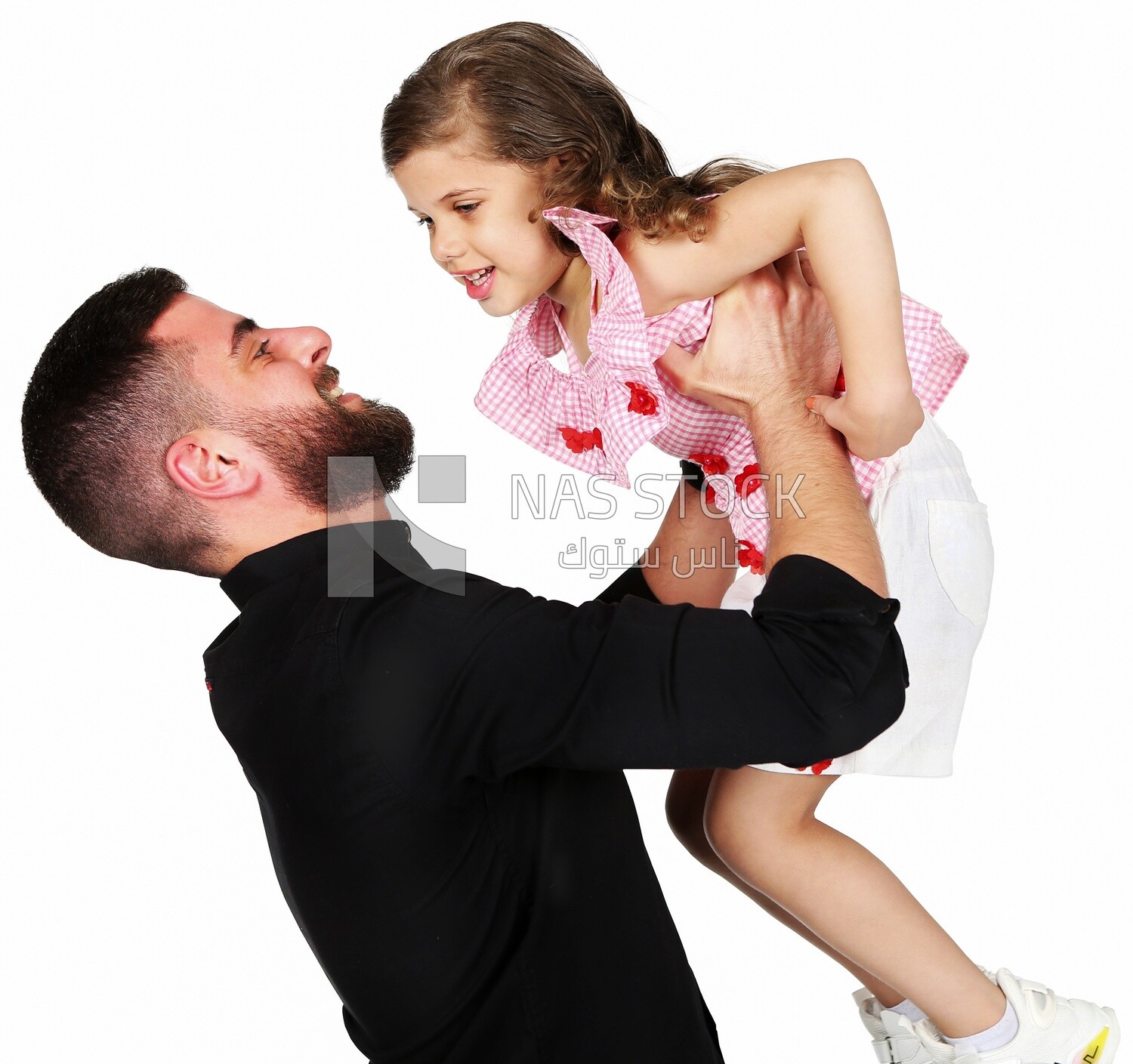 A father carrying his daughter